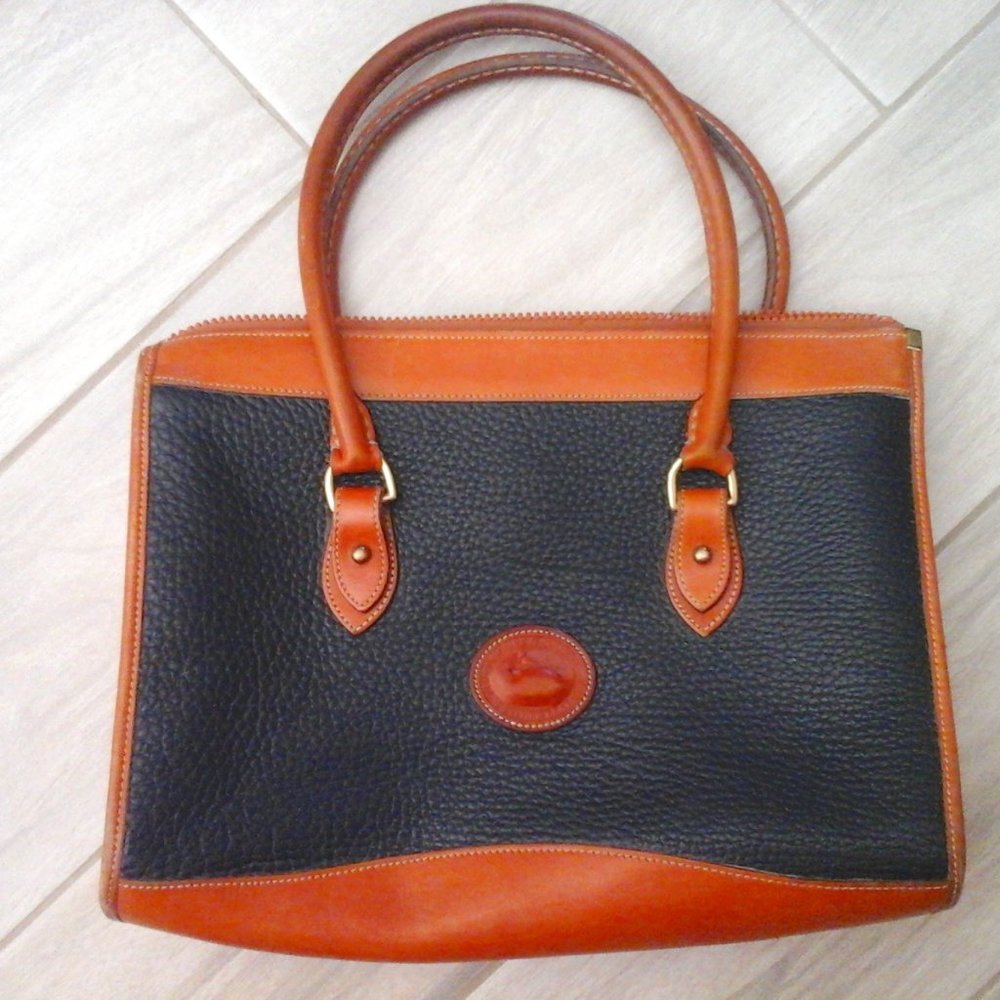 Dooney & Bourke Vintage Black and Tan Satchel Handbag.   Size 9x12x4